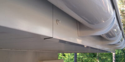 White plastic rain gutter White plastic rain gutter